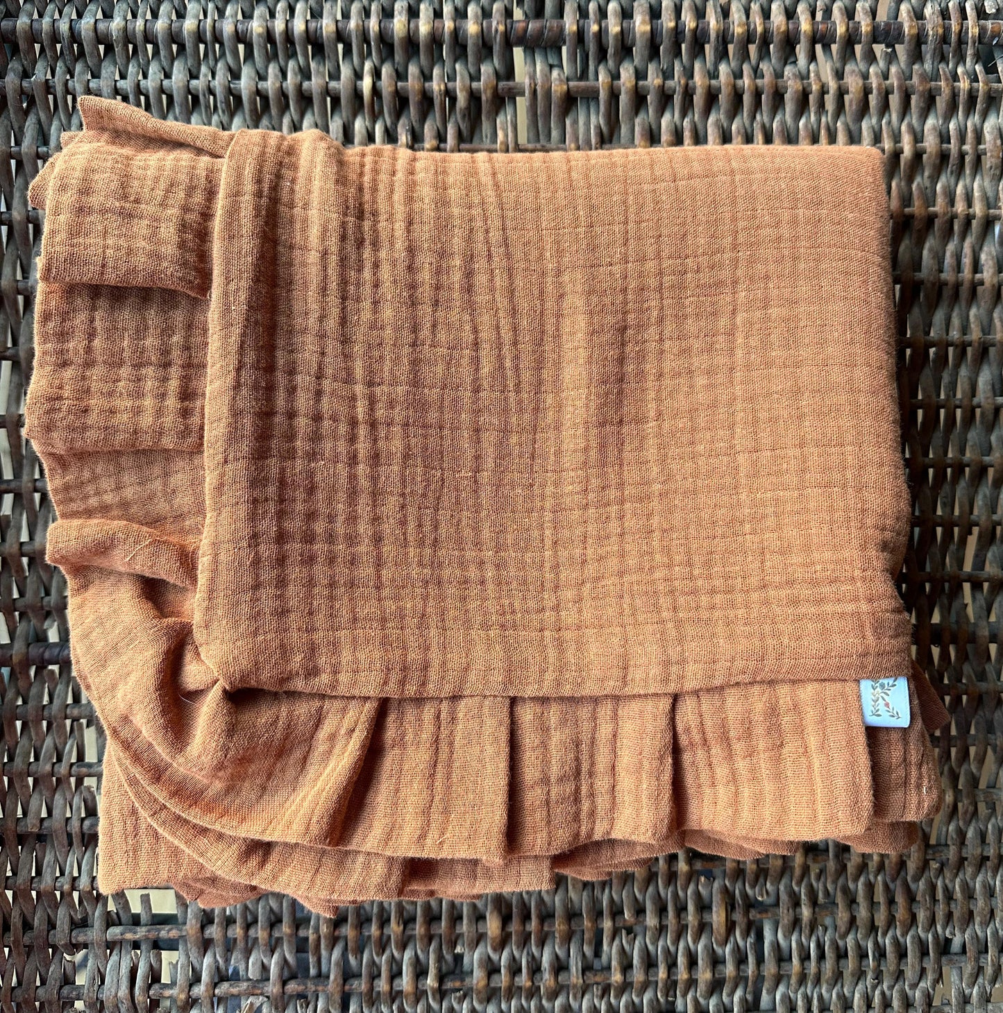 Manta Sofía terracota