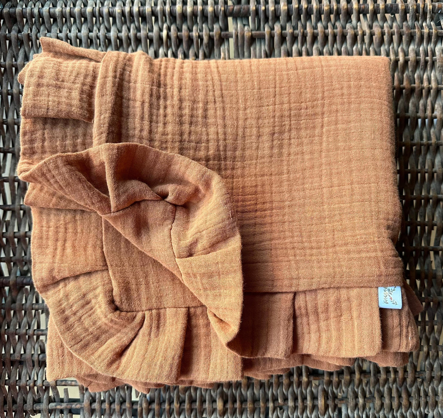 Manta Sofía terracota